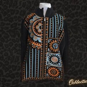 Bob Mackie Black, blue, and orange knit and leather sweater with embroidery